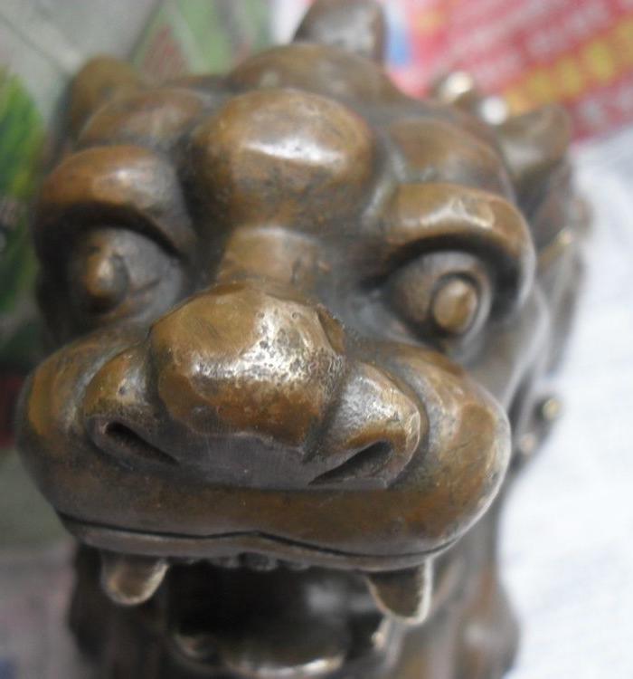 大明时期的老铜器摆件龙的九儿子貔貅《招财进