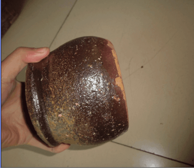 早期酱釉流黄的小罐一只_早期酱釉流黄的小罐