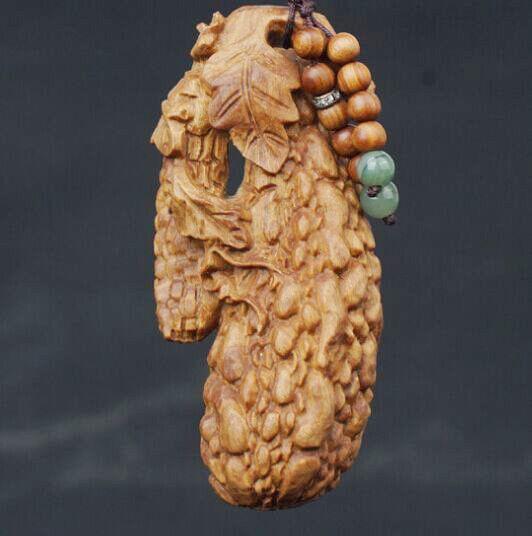 澳洲檀香挂件苦尽甘来 木雕 苦瓜手把件_澳洲