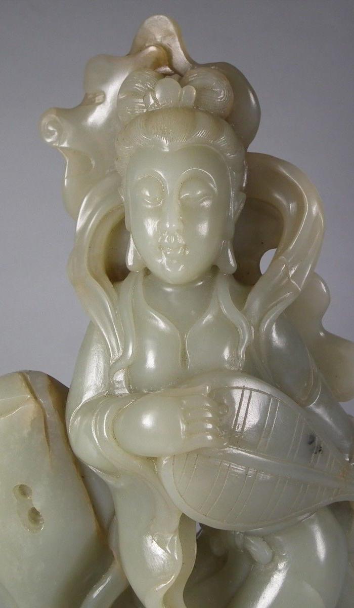 代和田青白玉镂空圆雕山石莲蓬童子仙女琵琶山