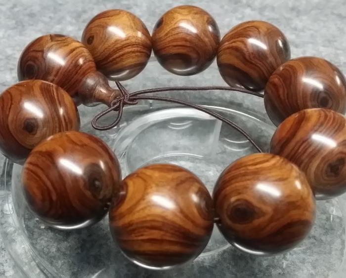 格_紫檀柳2.5对眼手串图片_来自藏友kkksss_