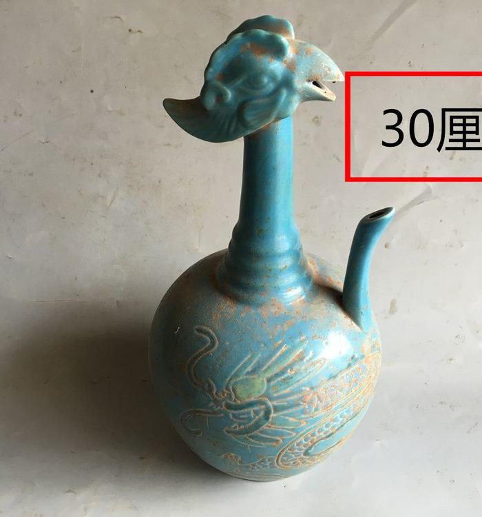 出土宋代蓝釉凤凰头瓶_出土宋代蓝釉凤凰头瓶
