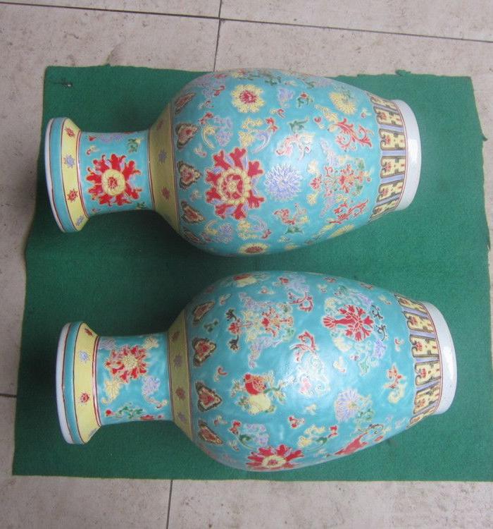 民国名人仿清壅正官窑曰夜发光瓶一对。_民国