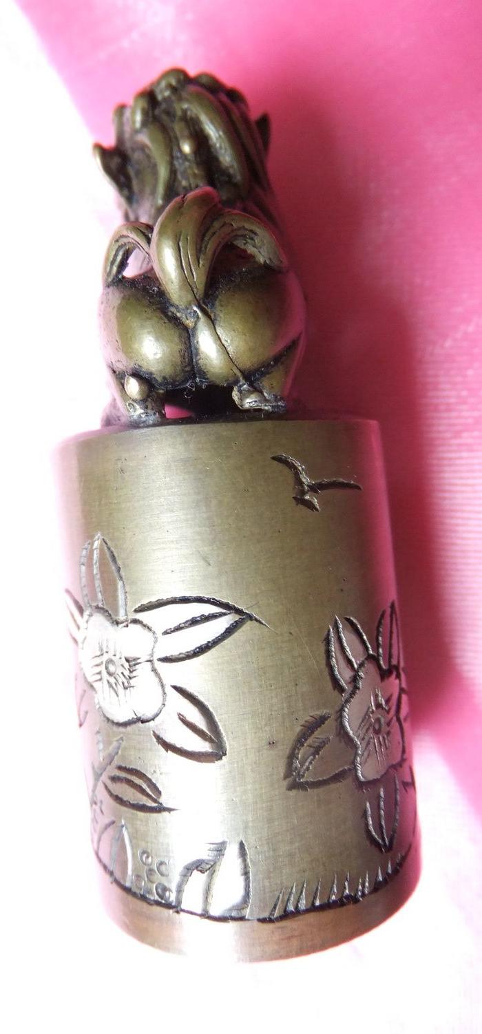 子孙延绵狮子黄铜章一枚_ 子孙延绵狮子黄铜