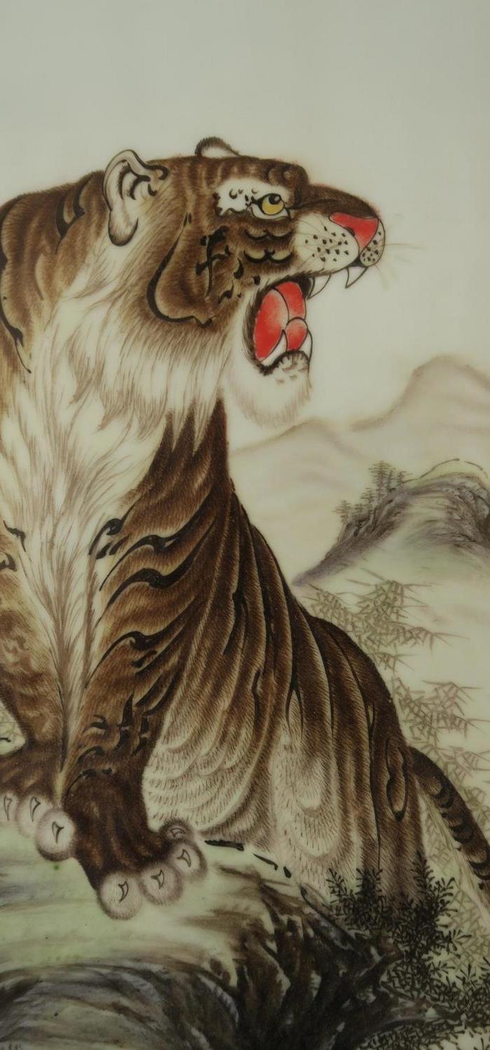 毕伯涛威云乾坤瓷板画一对_毕伯涛威云乾坤瓷