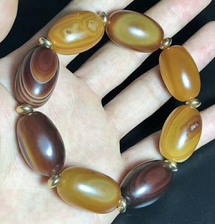 尼泊尔回流九页石岩天眼石一眼天珠手串