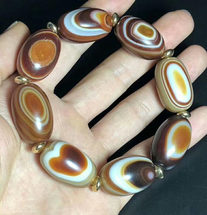 尼泊尔回流九页石岩天眼石一眼天珠手串