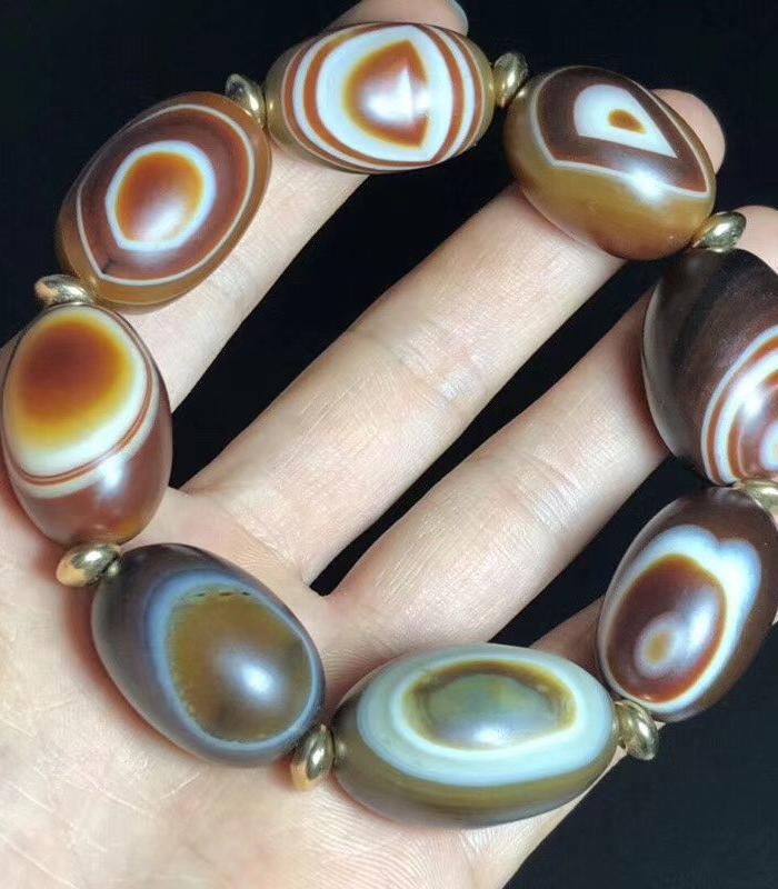 尼泊尔回流九页石岩天眼石一眼天珠手串