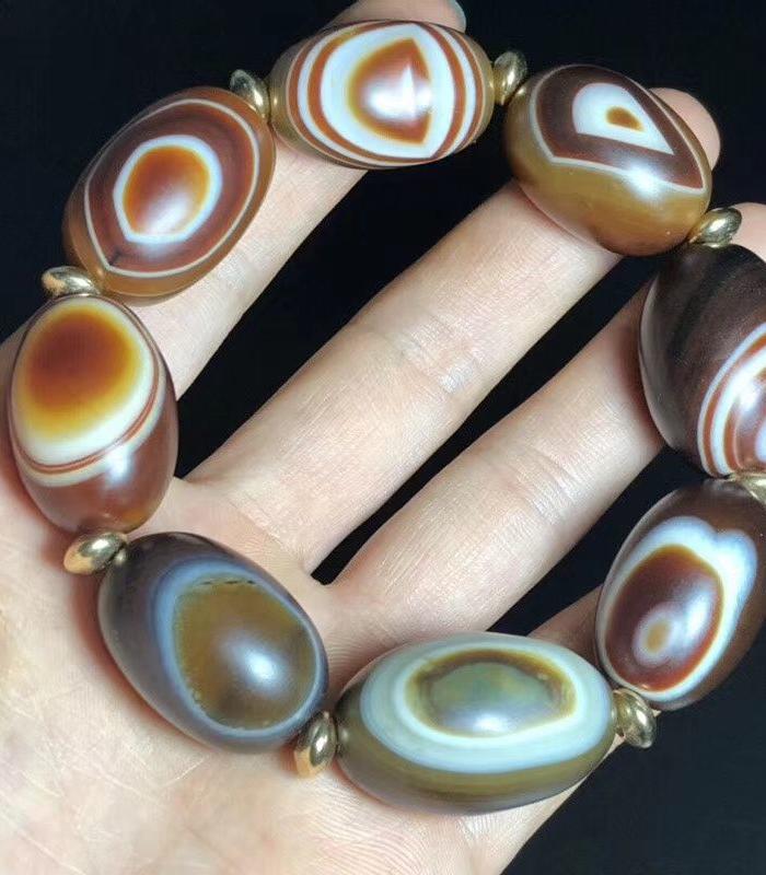 尼泊尔回流九页石岩天眼石一眼天珠手串