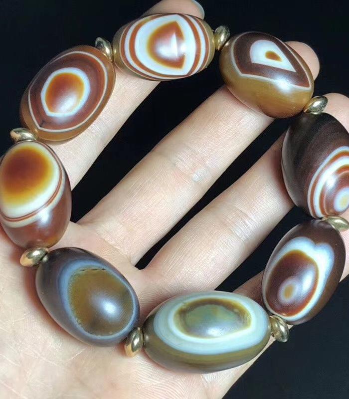 尼泊尔回流九页石岩天眼石一眼天珠手串