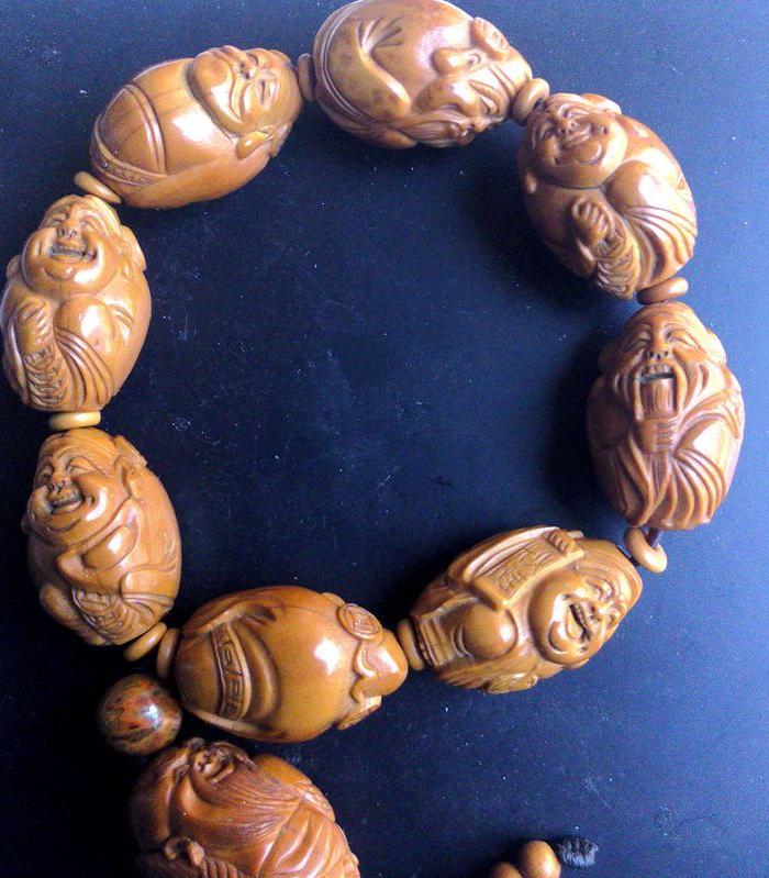 已挂瓷,橄榄核大籽精雕手串