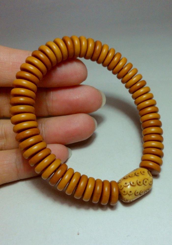 老骨珠配橄榄核隔片手串!