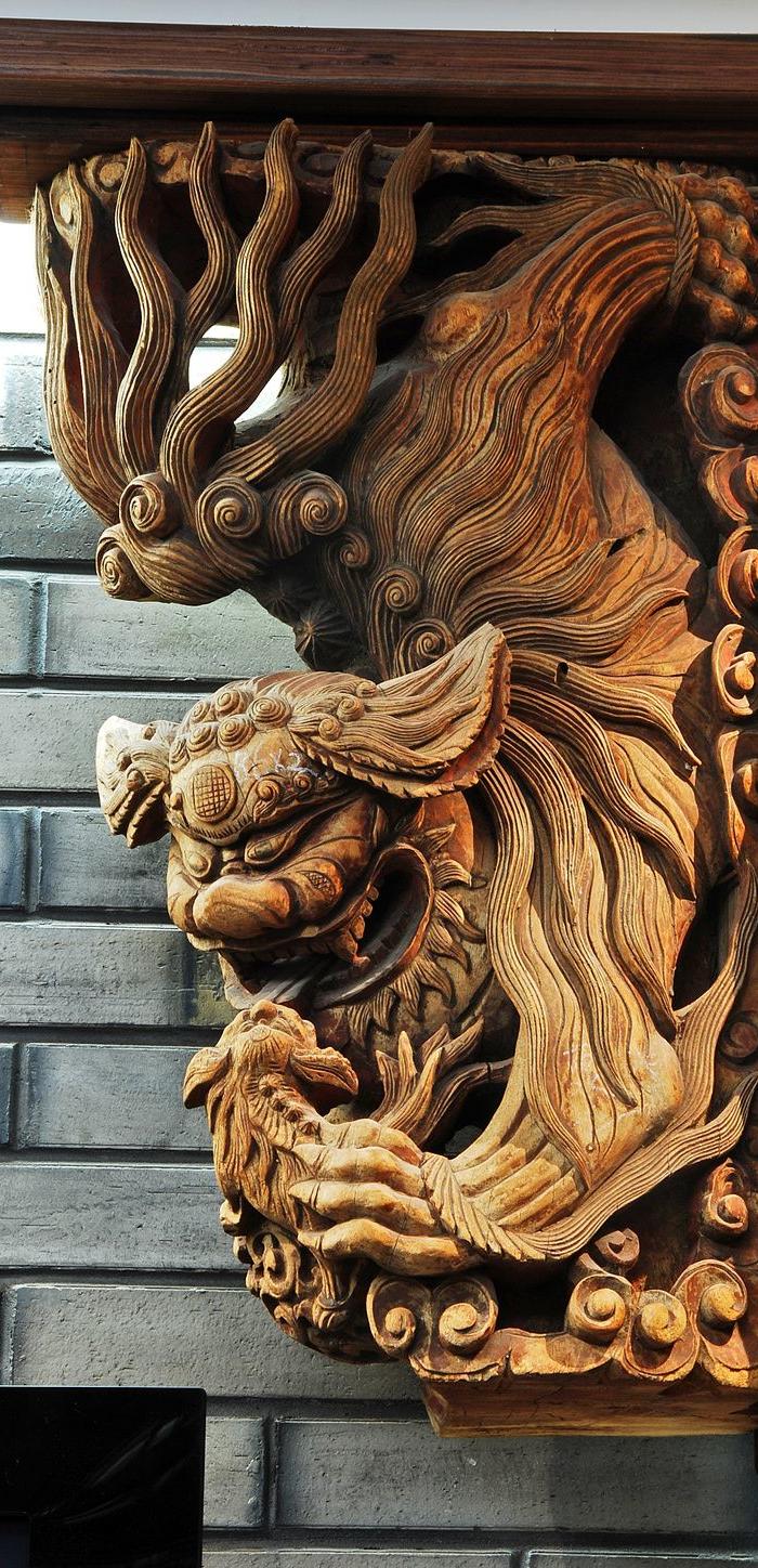 精工狮子戏球牛腿一对