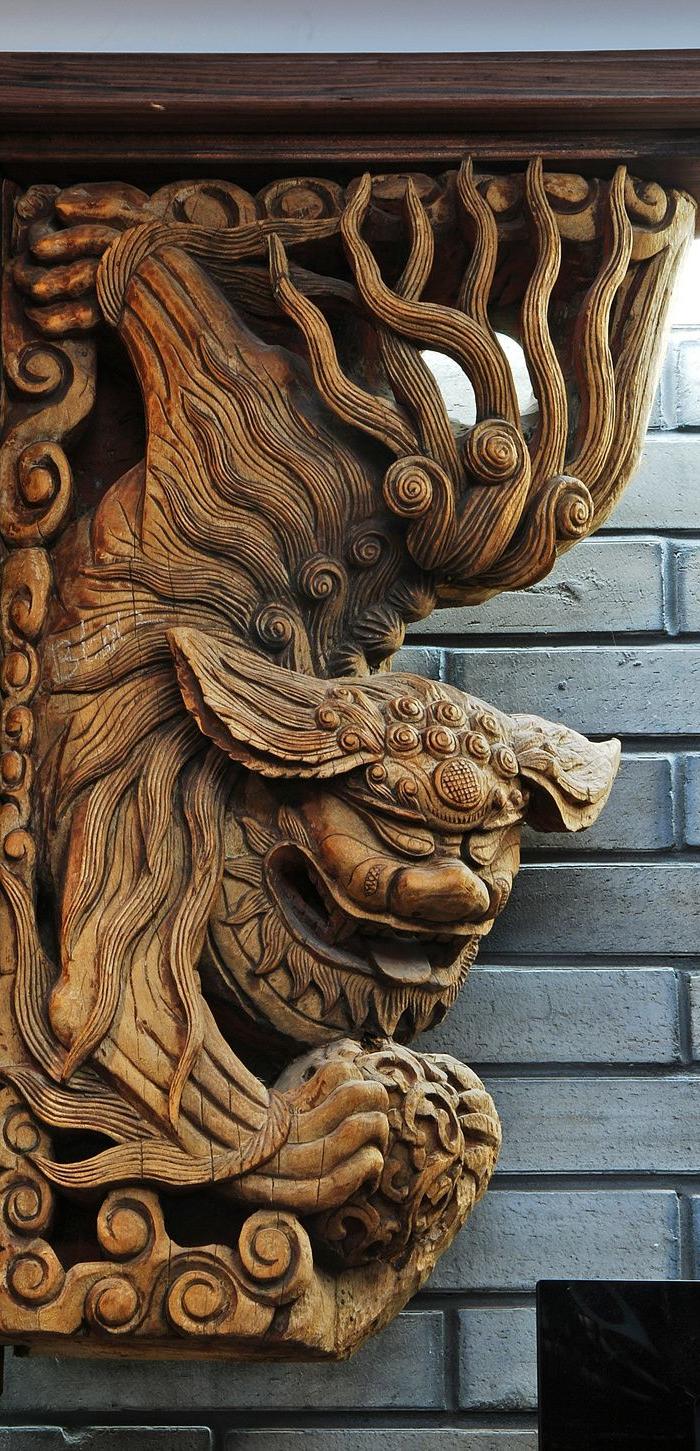 精工狮子戏球牛腿一对