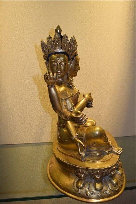 紫铜鎏金三头八臂佛