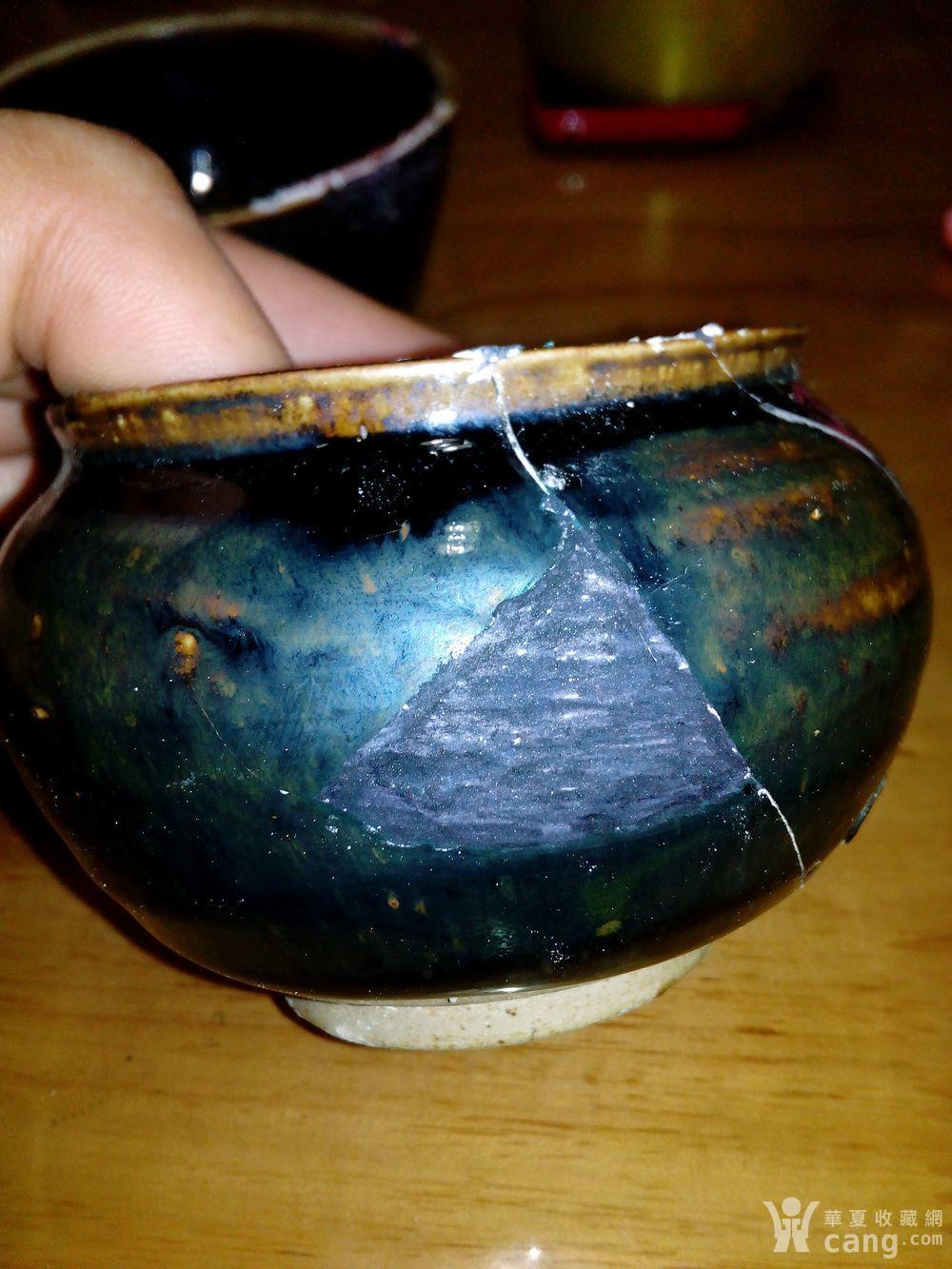 一个釉水漂亮的破罐子