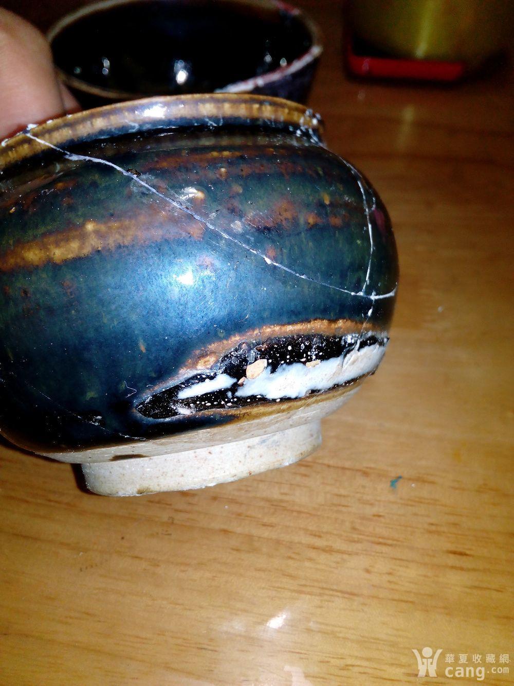 一个釉水漂亮的破罐子