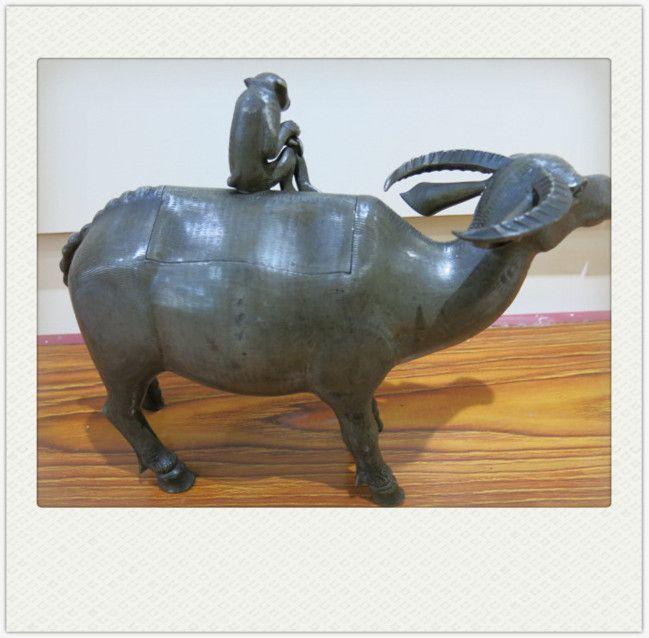 锡器猴骑牛茶叶罐