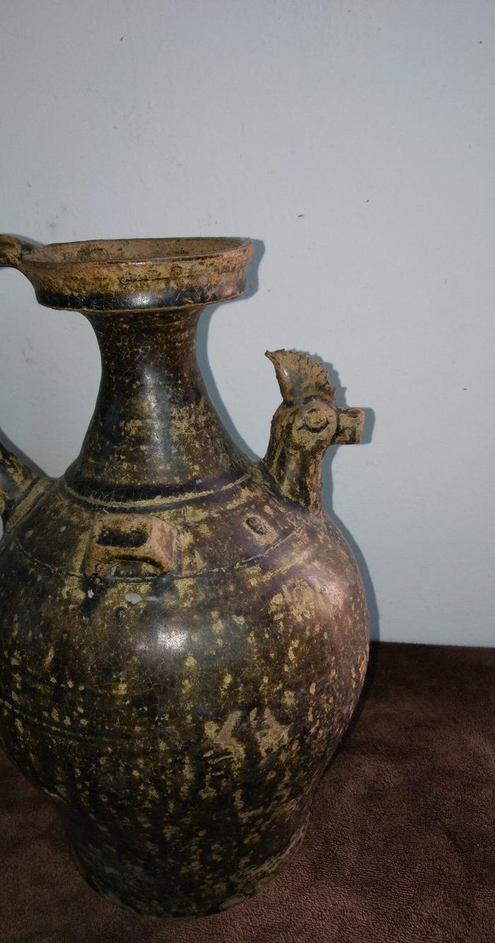 一件黑釉鸡首壶