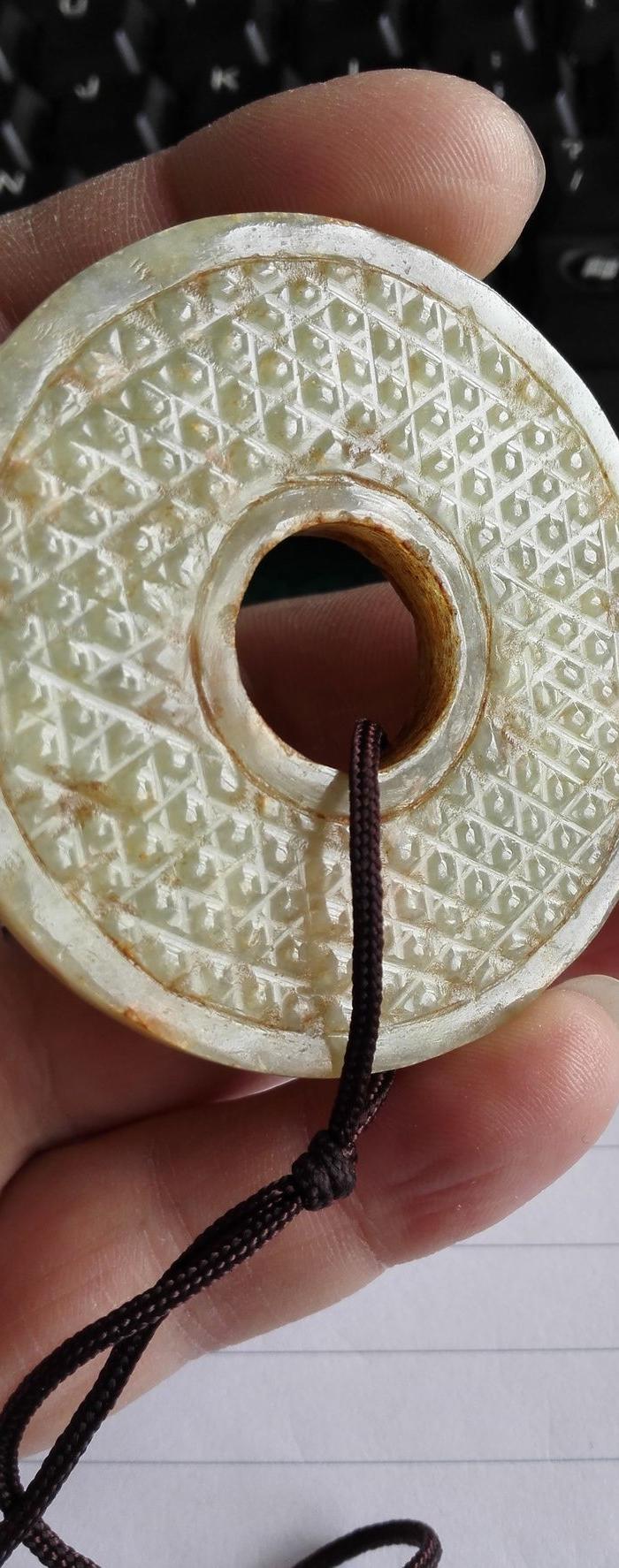 西汉和田玉蒲纹玉璧