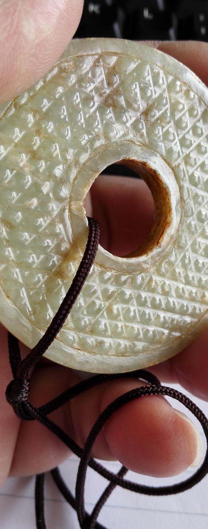 西汉和田玉蒲纹玉璧