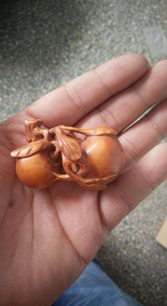 黄杨木桃子手把件