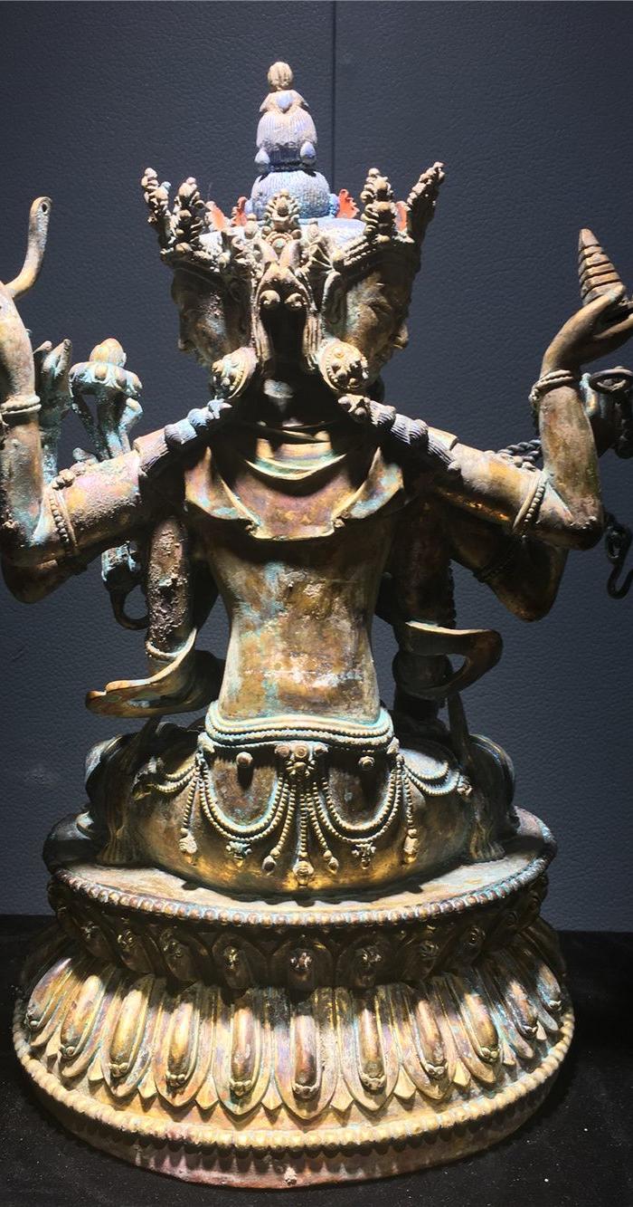 铜鎏金三头八臂佛