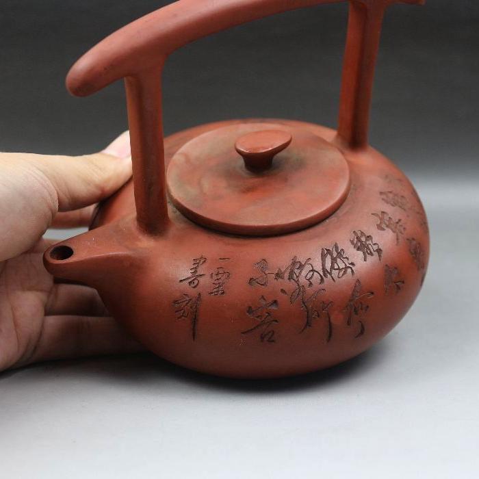 名家一粟刻绘提梁紫砂壶