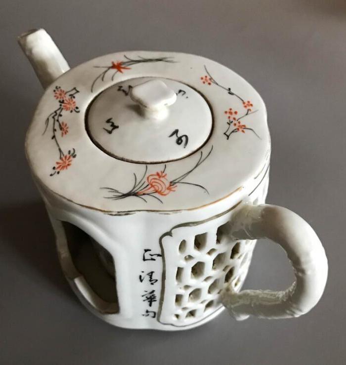 唐子桢浅绛镂空壶