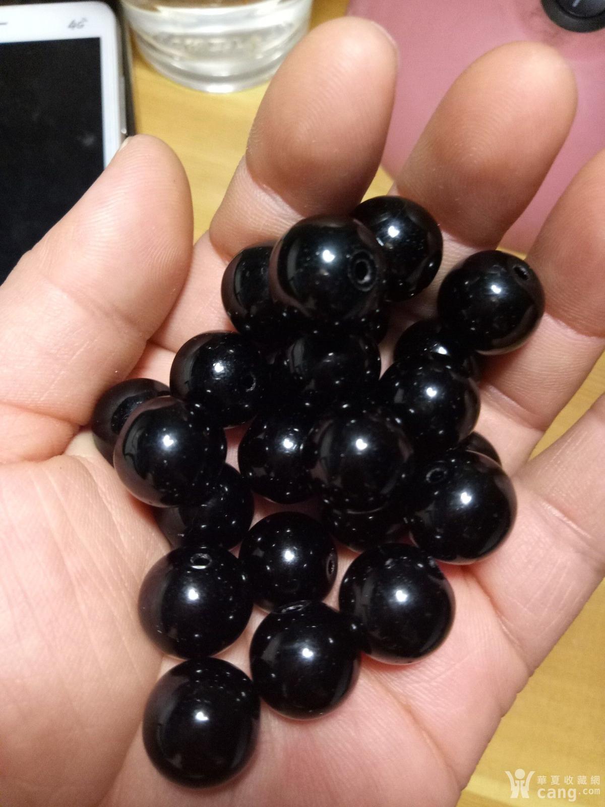 清代传世的黑玛瑙珠子24颗