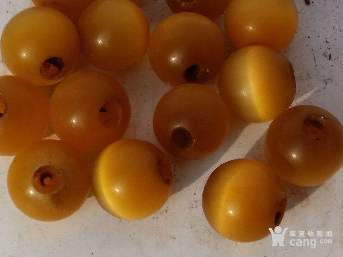 收来清代猫眼石珠子