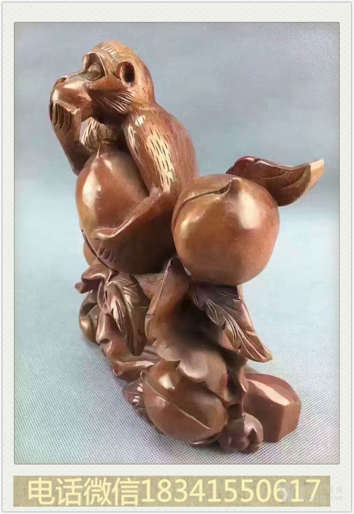 樟木猴子抱寿桃摆件 5.30
