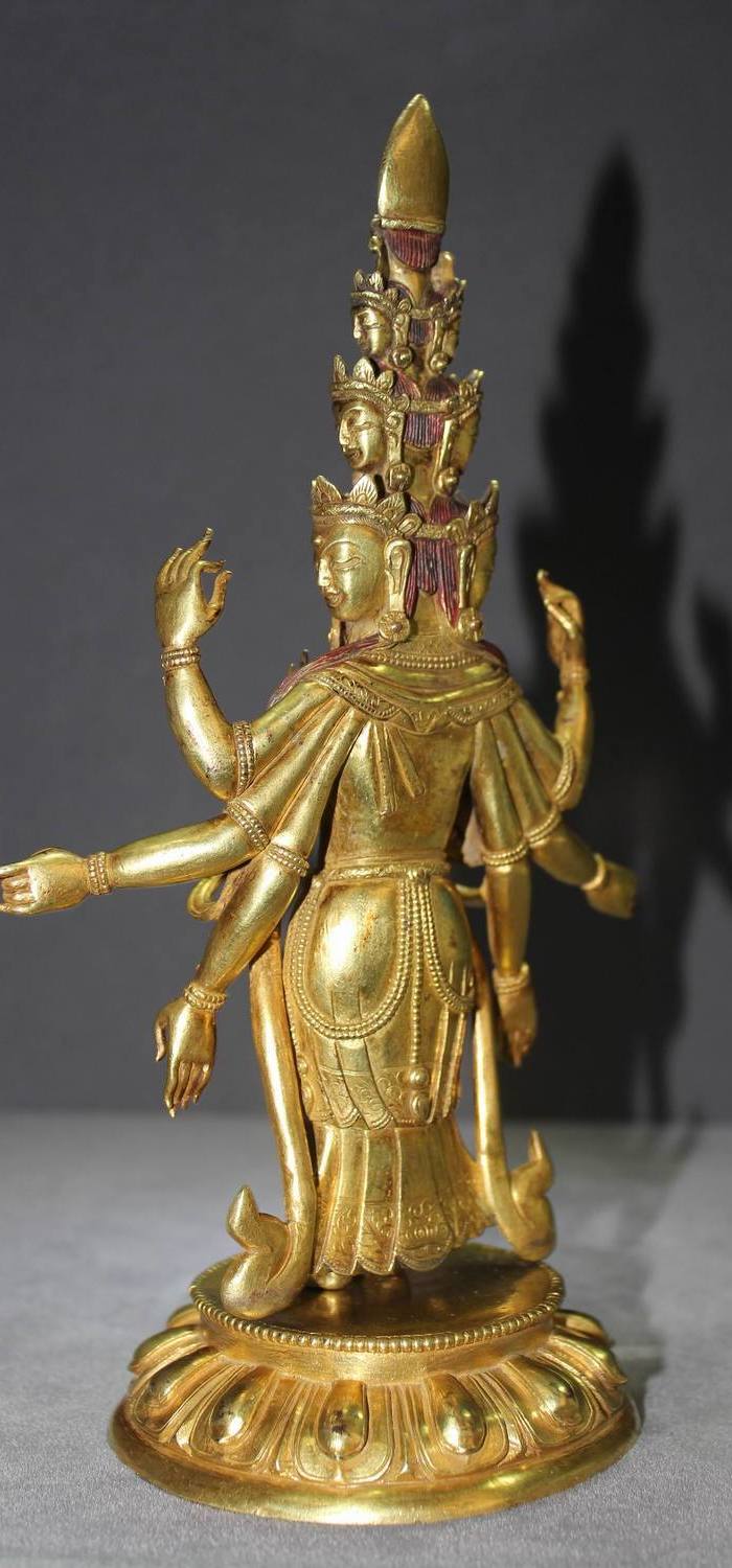 紫铜镏真金十二面八臂佛