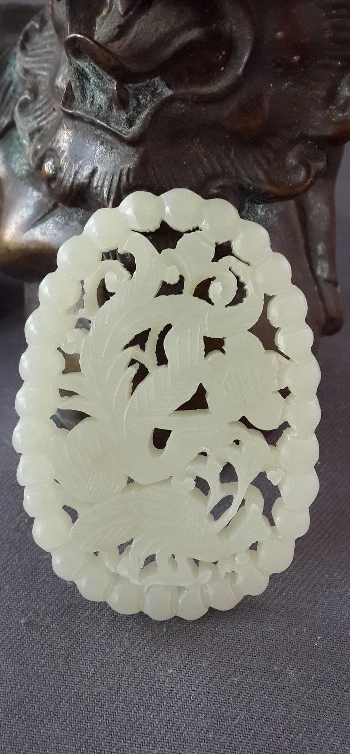 和田白玉凤凰连珠纹椭圆形玉佩