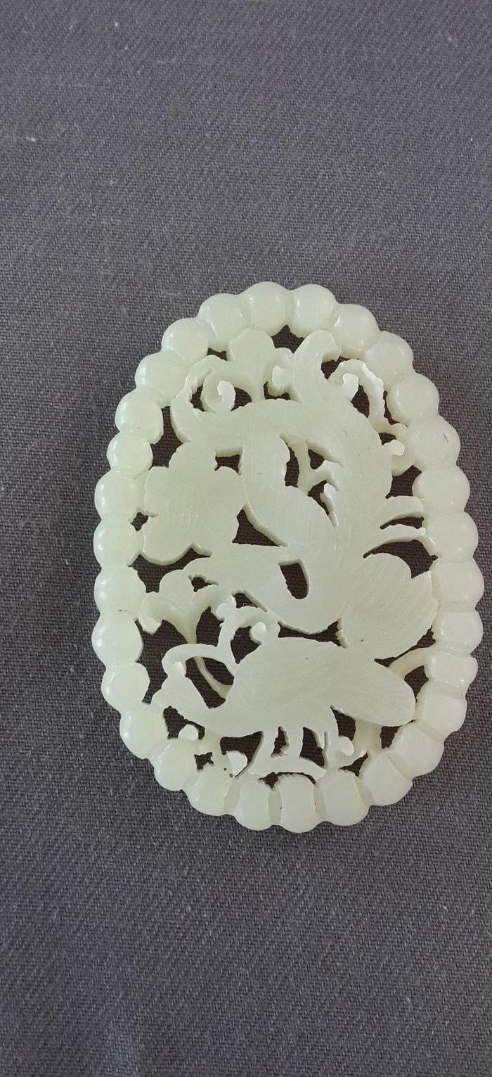 和田白玉凤凰连珠纹椭圆形玉佩