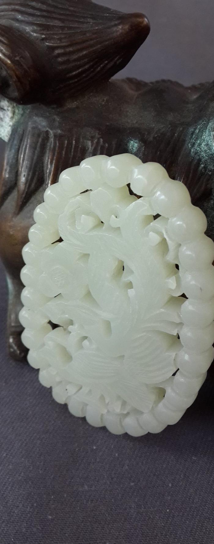 和田白玉凤凰连珠纹椭圆形玉佩