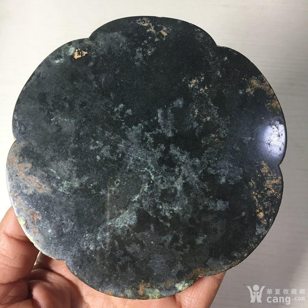 **黑漆古铜镜
