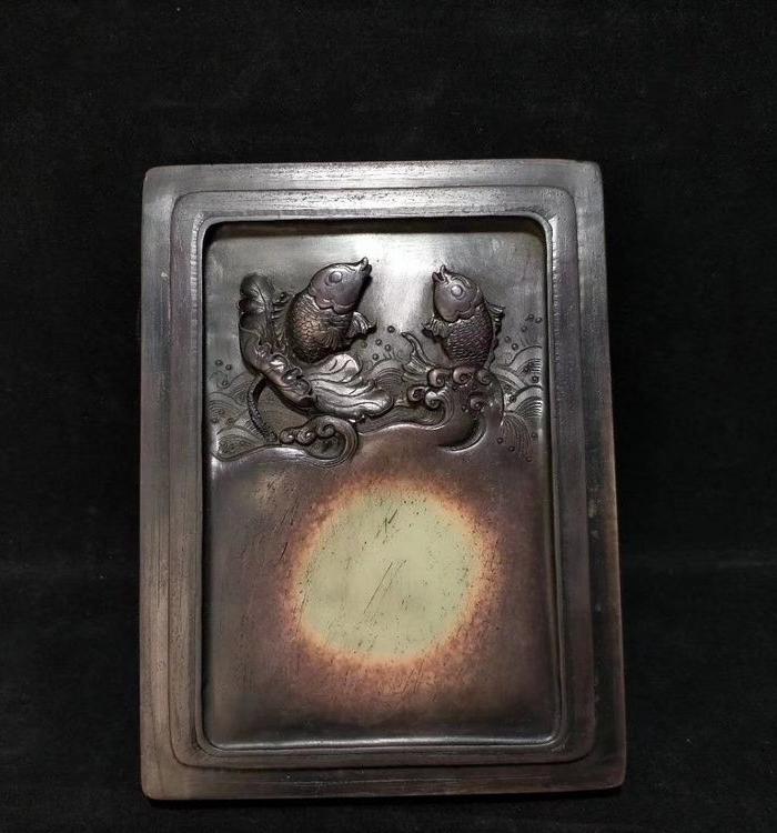 紫袍玉带砚连年有余