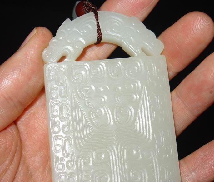 西周工兽面满工玉牌