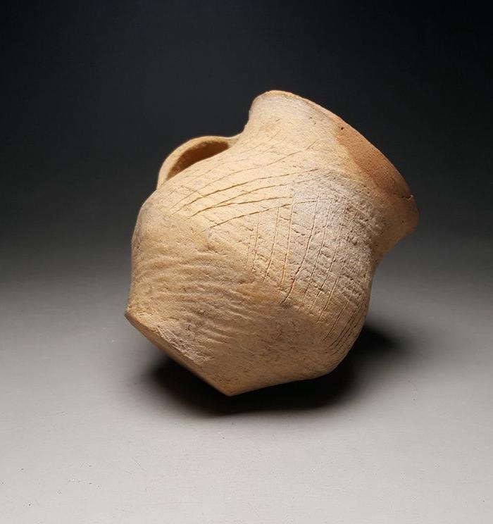 齐家文化单耳陶杯