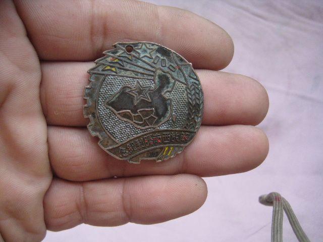 一枚保存不错的1950年解放西南胜利纪念章