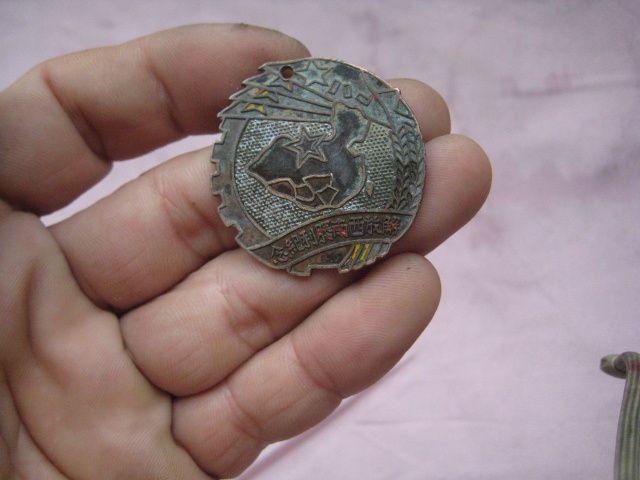 一枚保存不错的1950年解放西南胜利纪念章