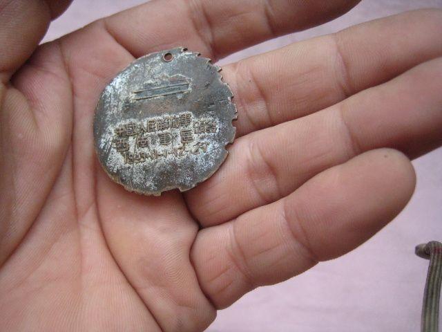 一枚保存不错的1950年解放西南胜利纪念章