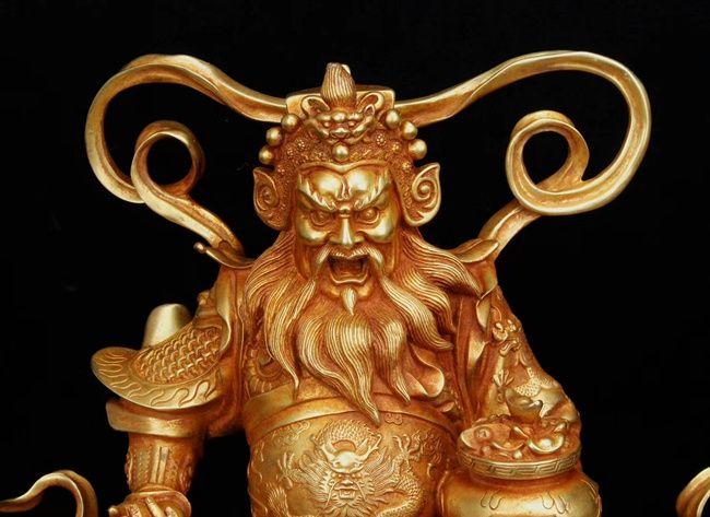 明代精铸铜胎鎏金财神赵公明骑虎像