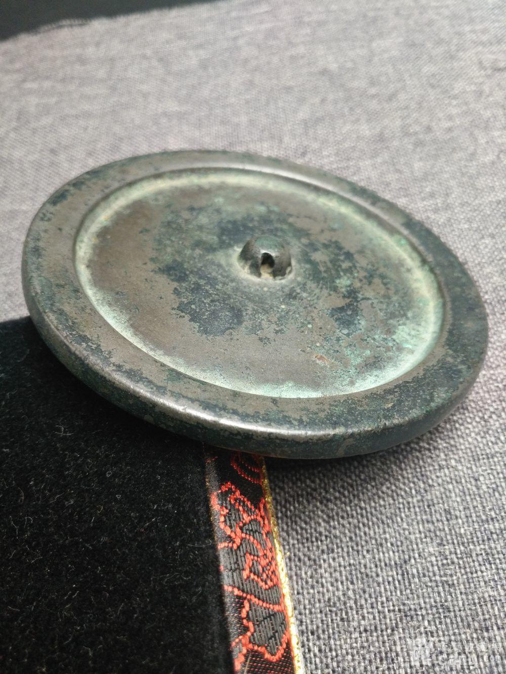 明代素面弦纹铜镜.