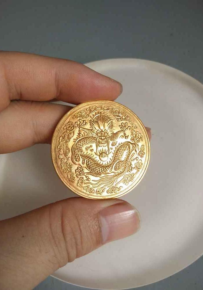 少见的大清金币丁未纯金币