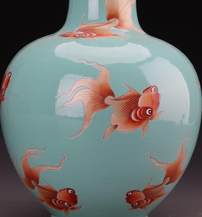 慎德堂款松石绿釉金鱼纹石榴瓶