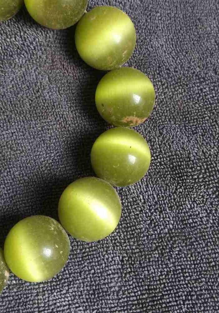 少见的蜜黄猫眼石一串