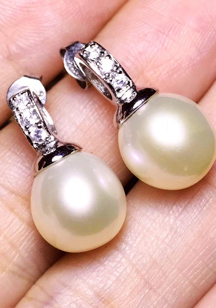 天然淡水珍珠香槟色漂亮近圆珍珠银镀白金镶耳钉一对