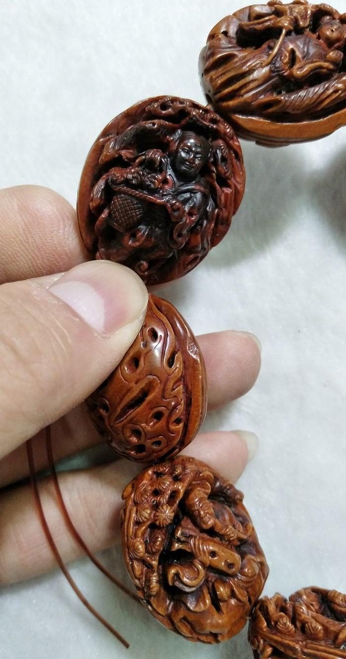 精品桃核雕刻明暗八仙图手串